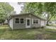 Cozy one-story home with tidy landscaping, neutral siding, and an attached single-car garage at 521 Elmhurst Pl, Whiteland, IN 46184