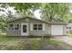 Charming single-story home with neutral siding, a garage, and a well-maintained front yard at 521 Elmhurst Pl, Whiteland, IN 46184