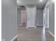 Hallway with hardwood floors that connects all the rooms at 521 Elmhurst Pl, Whiteland, IN 46184