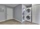Laundry room with washer and dryer connections next to a bathroom at 521 Elmhurst Pl, Whiteland, IN 46184