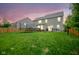 Large backyard with green grass and lots of space at 5374 John Quincy Adams Ct, Plainfield, IN 46168