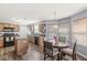 Spacious eat-in kitchen with wood cabinets, stainless steel appliances, and modern finishes. Ready for entertaining at 5671 Glass Chimney Ln, Indianapolis, IN 46235