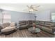 Spacious living room featuring modern finishes, a cozy seating area, and ample natural light, perfect for relaxation at 5671 Glass Chimney Ln, Indianapolis, IN 46235
