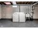 Basement laundry area with washer, dryer, laundry tub and painted walls at 6264 Central Ave, Indianapolis, IN 46220