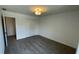 Cozy bedroom with neutral carpet, white walls, a closet, and ceiling light, ready for your personal touch at 6338 Rippling Rock Dr, Plainfield, IN 46168