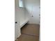 Mudroom featuring a built-in bench and storage space with easy access to the outdoors at 6338 Rippling Rock Dr, Plainfield, IN 46168