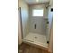 Modern walk-in shower with sleek tile and glass enclosure at 6338 Rippling Rock Dr, Plainfield, IN 46168