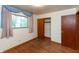 Bedroom featuring hardwood floors and a closet at 6498 N County Road 475 E, Pittsboro, IN 46167