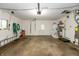 Spacious garage with ample storage space, a service door, and a window at 6498 N County Road 475 E, Pittsboro, IN 46167