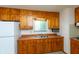 Well-lit kitchen featuring classic wood cabinets and stainless steel sink at 6498 N County Road 475 E, Pittsboro, IN 46167