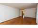 Living room with hardwood floors and a view into another room at 6498 N County Road 475 E, Pittsboro, IN 46167