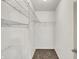 Walk-in closet with metal shelving units at 7061 Blankenship Ave, Indianapolis, IN 46217