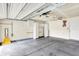 Spacious garage featuring ample storage cabinets, high ceilings, and convenient access at 7061 Blankenship Ave, Indianapolis, IN 46217