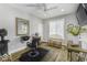 Bright salon featuring hardwood floors, lots of natural light, salon chair, and ample storage at 7648 Killarney Dr, Indianapolis, IN 46217