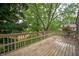 Exterior backyard deck with a seating area overlooking the backyard at 7831 Eagle Valley Pass, Indianapolis, IN 46214