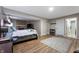 Finished basement with bedroom, stone fireplace, and bathroom at 7831 Eagle Valley Pass, Indianapolis, IN 46214