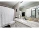 Bathroom features a vanity with drawers, a toilet, and a shower curtain at 7831 Eagle Valley Pass, Indianapolis, IN 46214
