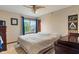 Cozy bedroom with window and a ceiling fan at 7978 Park Meadows Dr, Brownsburg, IN 46112