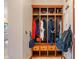 Entryway featuring a mudroom style wooden organizer to hang coats, store bags, and place shoes at 7978 Park Meadows Dr, Brownsburg, IN 46112