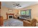Inviting living room with fireplace, plush seating, and ample natural light at 7978 Park Meadows Dr, Brownsburg, IN 46112