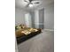 Cozy bedroom featuring a comfortable bed, neutral walls, plush carpet, and soft natural light at 8241 Morera Ct, Indianapolis, IN 46237