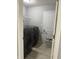 The laundry room is equipped with a modern washer and dryer and storage space at 8241 Morera Ct, Indianapolis, IN 46237