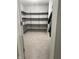 Walk-in closet featuring custom shelving and ample storage space for organization at 8241 Morera Ct, Indianapolis, IN 46237