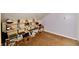 Attic area featuring carpeted floors and sports memorabilia displayed on white shelving at 8325 Chesterhill Ln, Indianapolis, IN 46239