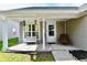 Inviting front porch with seating area, perfect for enjoying the outdoors and neighborhood views at 8325 Chesterhill Ln, Indianapolis, IN 46239