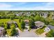 An aerial view of the neighborhood, with tree-lined streets and well-maintained homes, showcasing the community setting at 8631 Belle Union Pl, Indianapolis, IN 46113