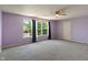 Large bedroom with natural light from the large three-sectioned window at 8631 Belle Union Pl, Indianapolis, IN 46113
