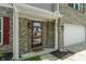 Close-up of the home's front door, showcasing the brick facade and house number at 8631 Belle Union Pl, Indianapolis, IN 46113