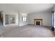 Bright living room with a fireplace and staircase views at 8631 Belle Union Pl, Indianapolis, IN 46113