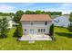 Aerial view showcasing a two-story home with siding, a deck, and a well-maintained lawn and beautiful landscaping at 8631 Belle Union Pl, Indianapolis, IN 46113