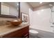 Bathroom with custom sink bowl, granite counters, vanity and a shower/tub combo at 876 Box Turtle Ct, Columbus, IN 47201