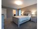 Bright bedroom with neutral decor, ensuite bath and furniture at 876 Box Turtle Ct, Columbus, IN 47201