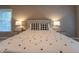 Close-up of bedroom showing bed with white comforter and two side tables with lamps at 876 Box Turtle Ct, Columbus, IN 47201