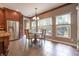 Charming dining area with natural light from many windows and stainless steel refrigerator at 876 Box Turtle Ct, Columbus, IN 47201
