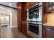 This gourmet kitchen features stainless steel appliances, custom cabinets, and a microwave at 876 Box Turtle Ct, Columbus, IN 47201