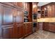 Custom cabinets with stainless steel appliances and a built-in microwave are featured in this gorgeous kitchen at 876 Box Turtle Ct, Columbus, IN 47201