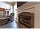 Living room fireplace close up and doorway to kitchen with eating area at 876 Box Turtle Ct, Columbus, IN 47201