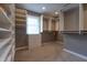 Walk-in closet with built-in shelving and ample storage space for clothes and accessories at 876 Box Turtle Ct, Columbus, IN 47201