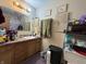Traditional bathroom with a standard sink, mirror and toilet at 8936 E 46Th St, Indianapolis, IN 46226
