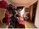 This bedroom has a bunk bed and one small window at 8936 E 46Th St, Indianapolis, IN 46226