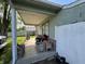 Cozy front porch with comfortable seating, perfect for relaxing outdoors at 8936 E 46Th St, Indianapolis, IN 46226