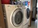 This laundry room has a modern Whirlpool washer and dryer at 8936 E 46Th St, Indianapolis, IN 46226