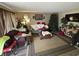 Comfortable living room featuring hardwood floors, a plush sofa, and decorative accents at 8936 E 46Th St, Indianapolis, IN 46226