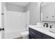 Bathroom with sleek fixtures, single vanity, toilet, and shower-tub combo at 9229 Crossing Dr, Fishers, IN 46037