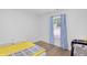 Well-lit bedroom featuring a window, plush carpets, and comfortable bed at 9229 Crossing Dr, Fishers, IN 46037