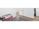 Hallway with wood-look floors and storage at 9229 Crossing Dr, Fishers, IN 46037